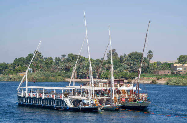 istock Small ships with sails for tours on the Nile river, Egypt, Africa 1132555833