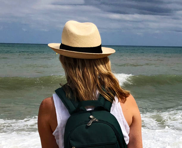 istock Woman looking at Mediterranean sea 1132557833