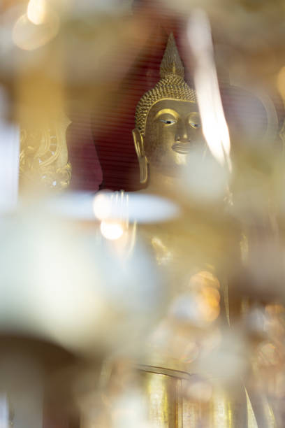 istock beautiful Abstract bokeh foreground on Buddha background 1132559631