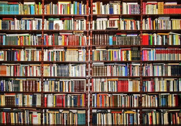 Books collection Whole big wall covered with lot of books bookstore stock pictures, royalty-free photos & images