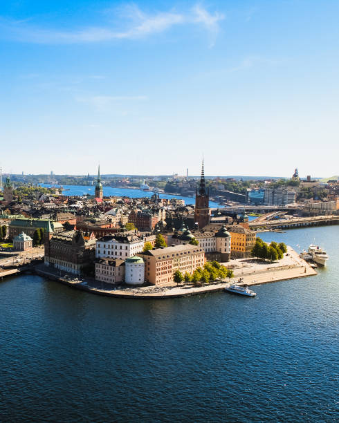 View of Stockholm skyline on Gamla Stan from above at the top of Stockholm Stadshus / town hall during a clear summer day (Stockholm, Sweden, Europe) Sightseeing in the city of Stockholm, the capital of Sweden, Europe during a clear summer day. kungsholmen town hall photos stock pictures, royalty-free photos & images