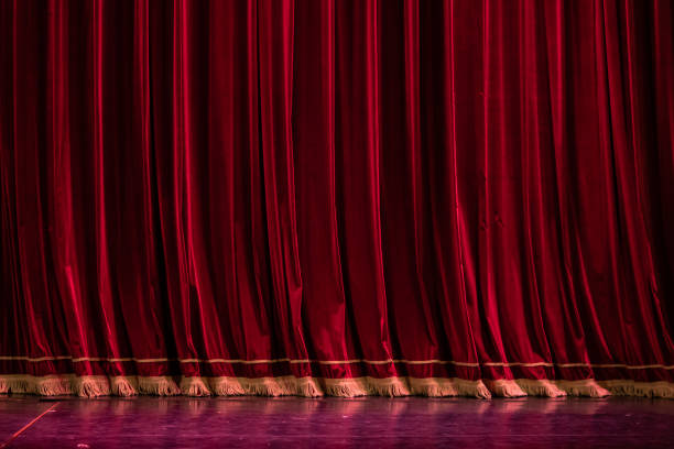 istock Red theater curtain 1132565445