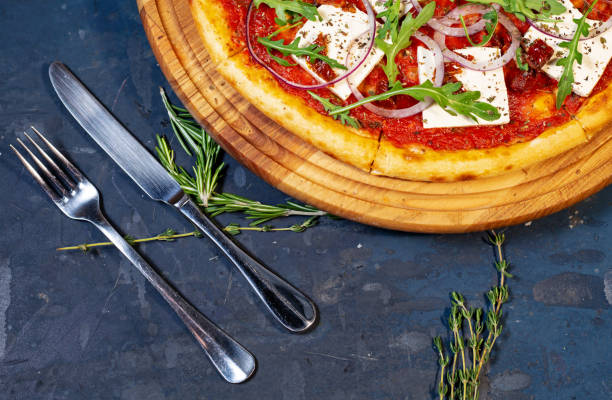 istock pizza with tofu and arugula 1132566467