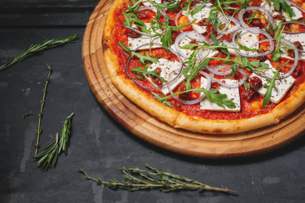 istock pizza with tofu and arugula 1132566581