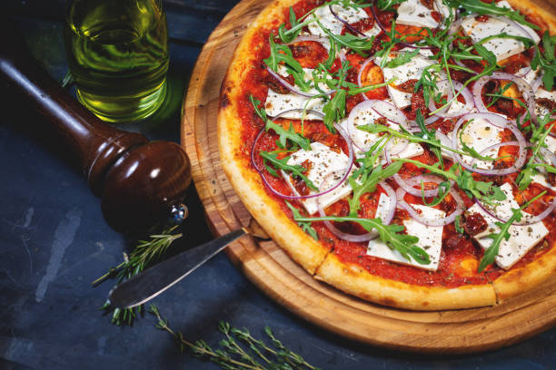 istock pizza with tofu and arugula 1132566588