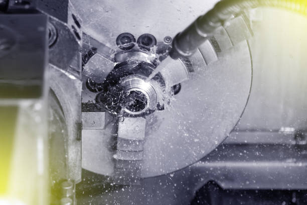 istock Spindle chuck and installed metal part in pocessing on high precision Cnc industrial lathe turning machine. CNC machine cuts off excess edges on metal part 1132576596
