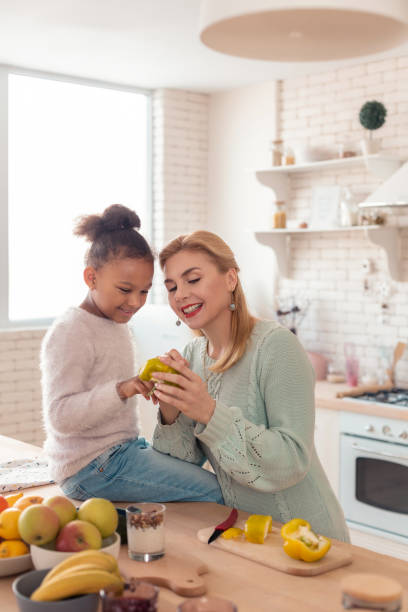 istock Mother and daughter feeling involved in cooking dinner 1132579424
