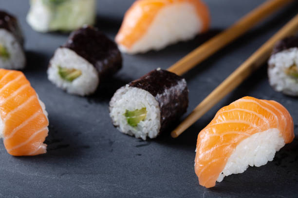 istock Fresh seafood sushi meal on darck background 1132581258