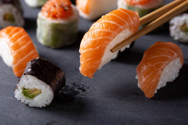 istock Fresh seafood sushi meal on darck background 1132582174