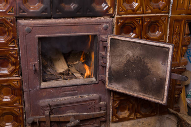 istock Open door from an old tiled stove 1132584980