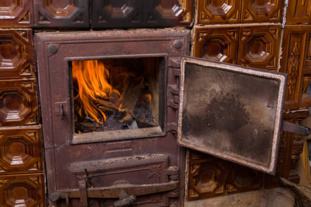 istock Open door from an old tiled stove 1132585052