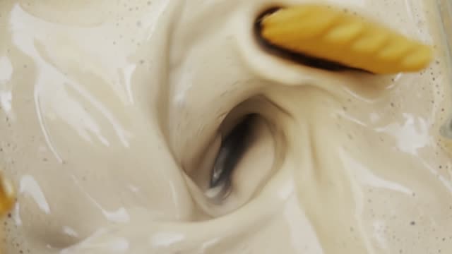 Blending cookies and cream at slow motion