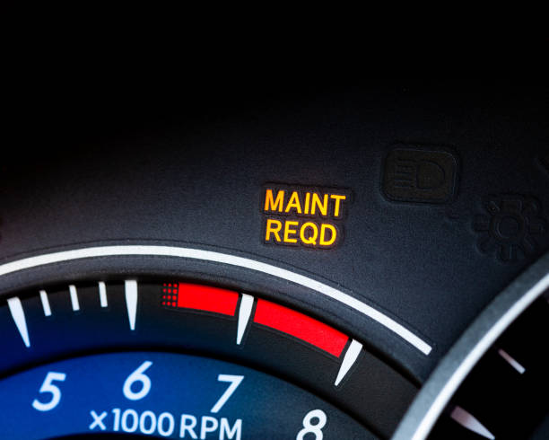 Engine maintenance or service light is on in car dashboard. Car dashboard cluster background stock photo