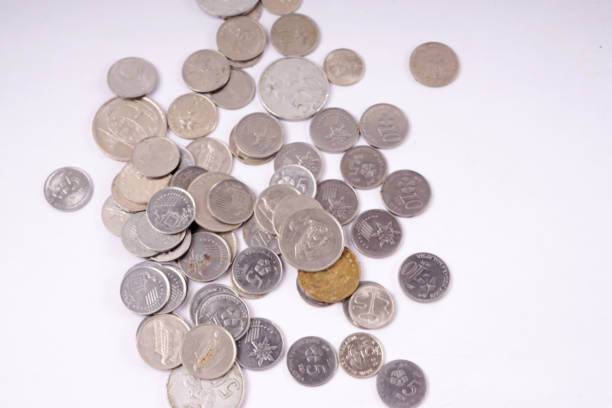 istock High Angle View Of Coins On White Background 1132592746