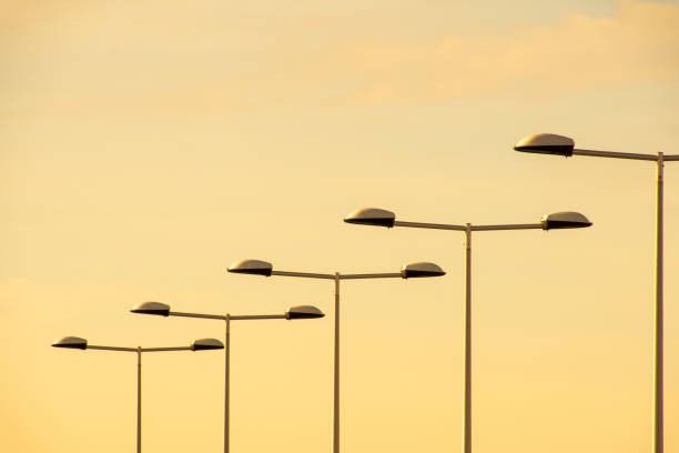 istock Low Angle View Of Street Lights Against Sky During Sunset 1132593207