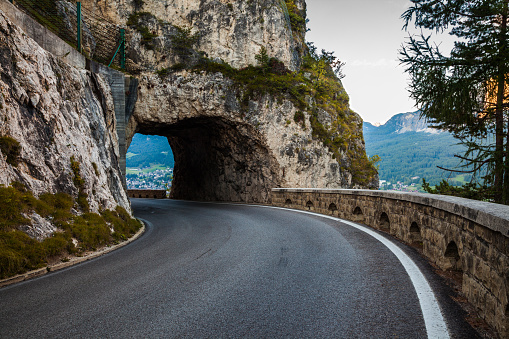 A tunnel cut through a mountain near the town of Cortina d'Ampezzo