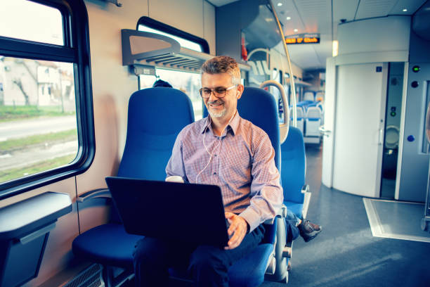 istock Businessman working and traveling by train 1132596434