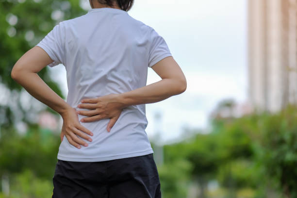 istock Midsection Of Woman Suffering From Backache 1132596441