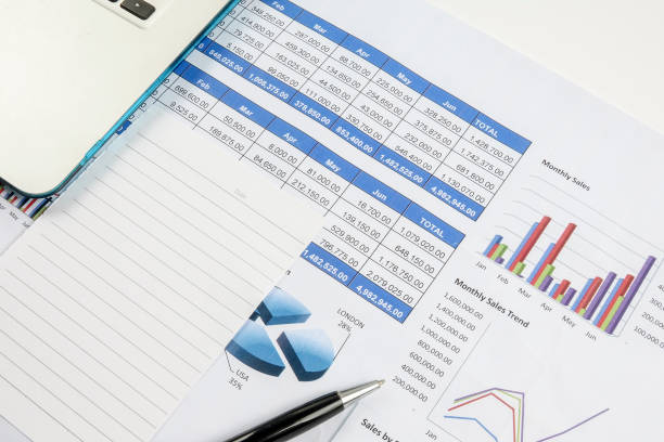 istock High Angle View Of Pen And Financial Dosuments With Laptop On Table 1132599022