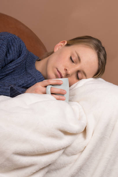 istock cute girl is sick and ill with the flu 1132601071