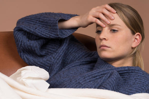 istock cute girl is sick and ill with the flu 1132601839