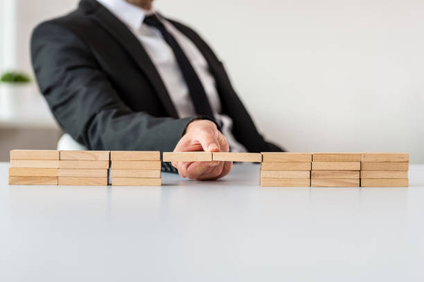 istock Conceptual image of business merger 1132602560