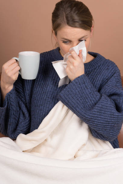 istock cute girl is sick and ill with the flu 1132603119