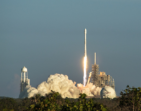 NASA Artemis 1 sits on launch pad 39B in April 2022 as part of the initial testing. Artemis 1 on the pad for initial wet dress testing that resulted in the original fuel leak issues. Shortly thereafter the SLS rocket was rolled back to the Vehicle Assembly Building (VAB) for repairs. Heat wave distortion is shown in lower portion of image (above the greenery) due to the distance and the heating of the day.