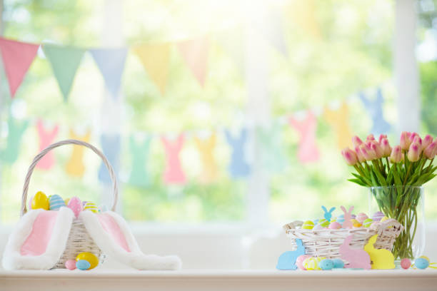 istock Easter home decoration. Eggs basket and bunny. 1132605785