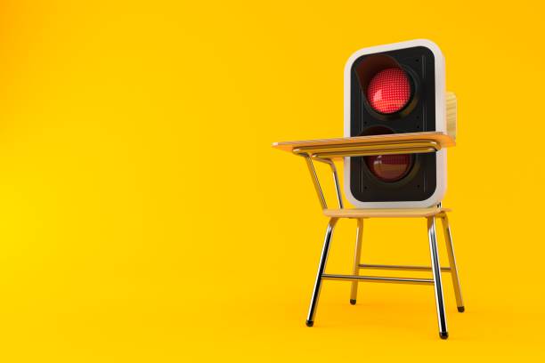 Red traffic light on school chair