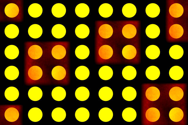 istock Abstract background. Graphic art. Yellow circles, black background with red squares. Seamless patterns 1132609836
