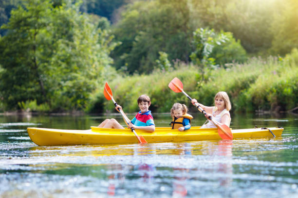 istock Child on kayak. Kids on canoe. Summer camping. 1132611033