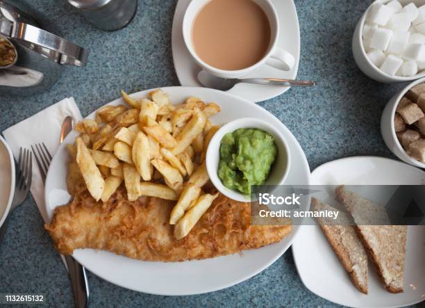 Fish And Chips With Mushy Peas Stock Photo - Download Image Now - Fish and Chips, Beach, Batter - Food