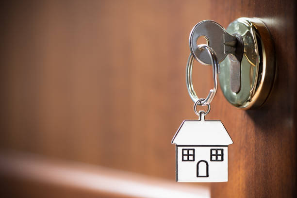 istock House key in the door 1132615955