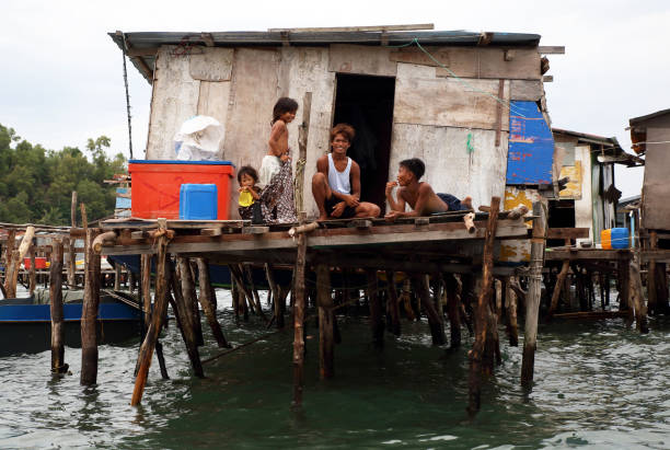 Poor Floating 200+ Poor Filipino Children Stock Photos, Pictures & Royalty-Free ...