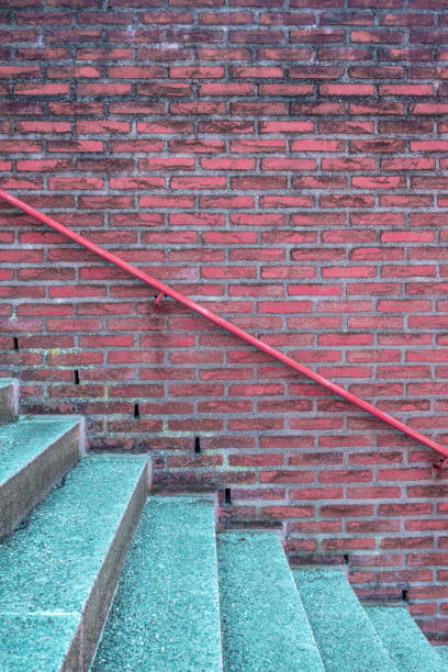 istock Stairway and brick wall with handrail 1132617008