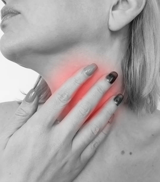 istock woman sore throat symptom 1132617638