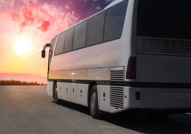 istock tourist bus moving along the highway 1132620846
