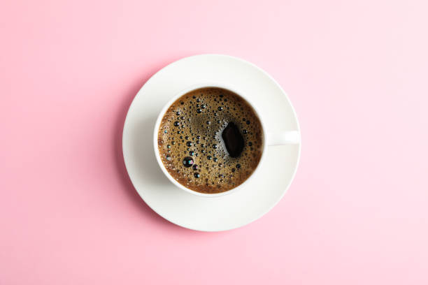 istock Cup of coffee on color background, space for text 1132620937