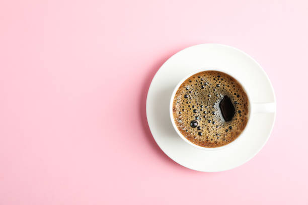 istock Cup of coffee on color background, space for text 1132620968