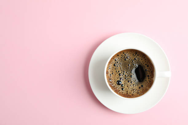 istock Cup of coffee on color background, space for text 1132621021