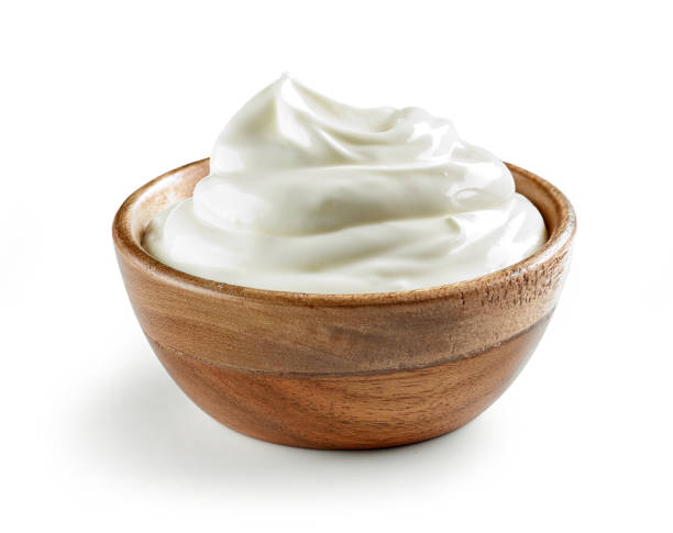 istock sour cream in wooden bowl 1132624516