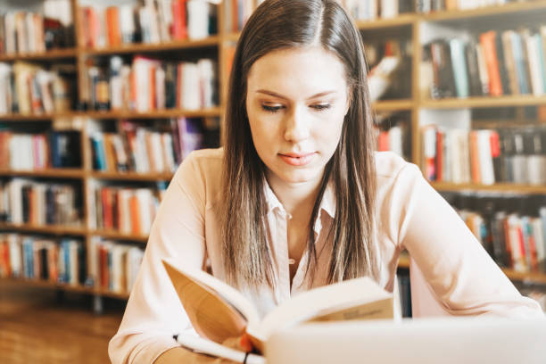 istock Just a girl and her book 1132626574