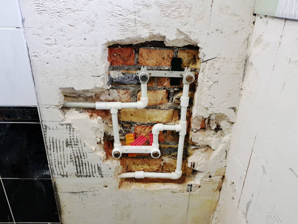 istock propylene pipe and gates in a brick wall - propylene welding 1132628248
