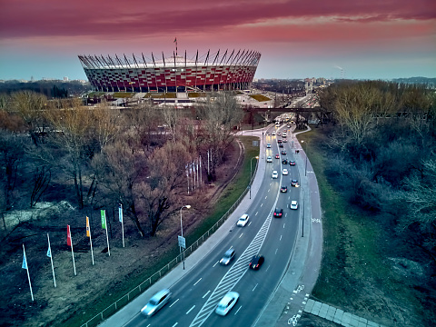 Beautiful panoramic aerial drone sunset view to The PGE Narodowy (official name) of National Stadium - Polish: Stadion Narodowy - football stadium located in Warsaw, Poland