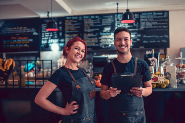 istock Smoothie Bar Colleagues Posing During The Day Shift 1132635209
