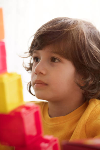 istock Happy child playing with Preschoolers Building Blocks 1132640408