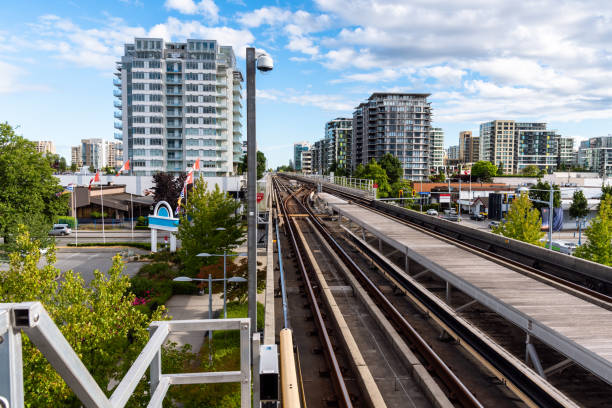Elevated Rail Tracks in a Urban Setting on a Clear Summer Day. Vancouver, BC, Canada.