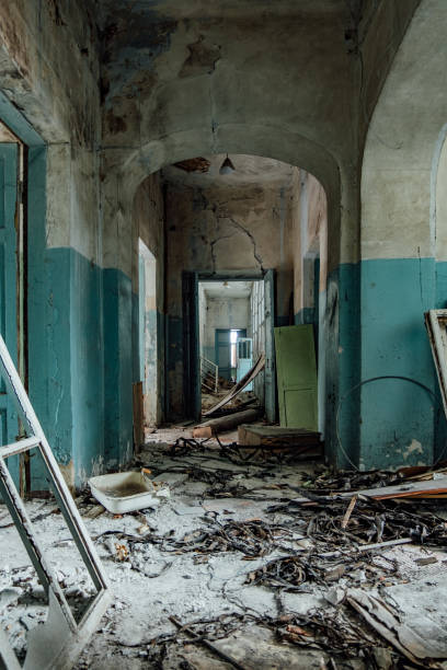 istock Dark and creepy corridor of old abandoned hospital 1132643708