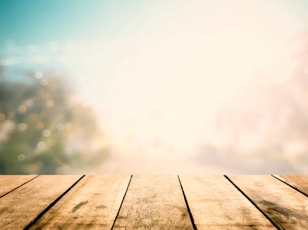 istock Perspective wood floor on blur mosque ramadan background. Window breakfast table top view bokeh in eid mubarak concept for montage presentation in fasting festival, culture of muslim religious. 1132644926